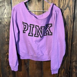 Pink off the shoulder sweater.